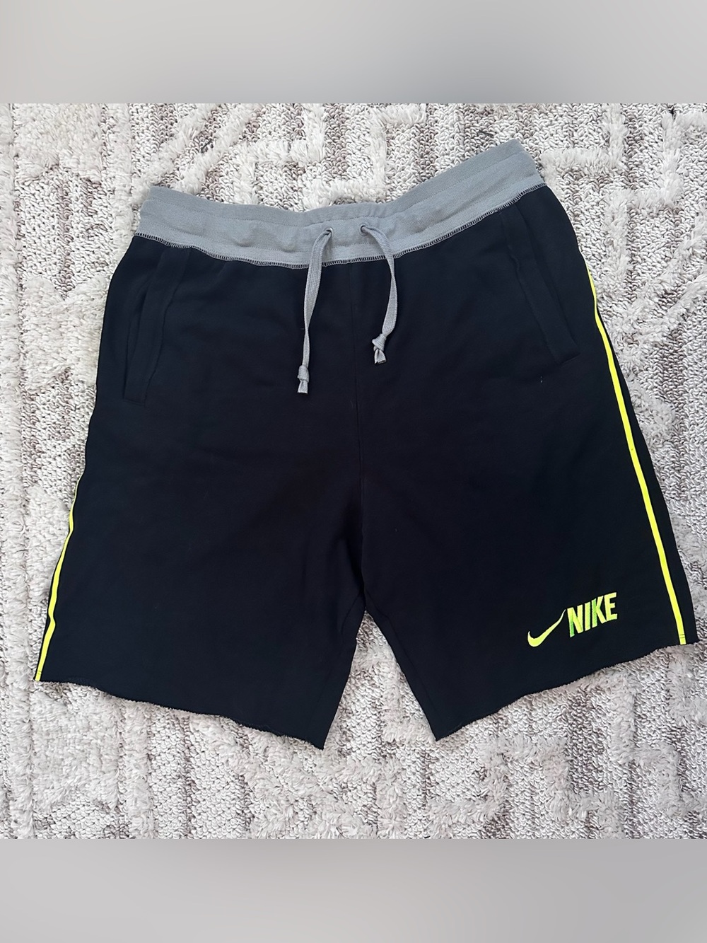 Nike Men's Black Athletic Shorts with Gray Waistband and Yellow Trim